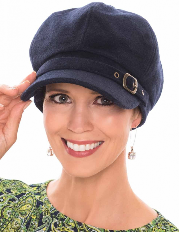 Topi newsboy dengan detail tali ikat